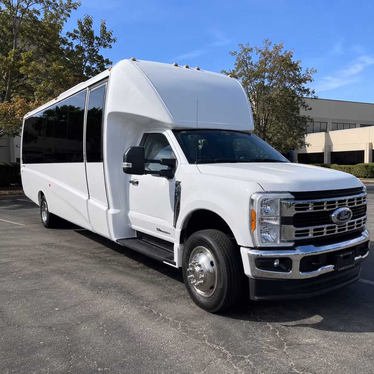 corporate airport transfer buses between sbd and ontario international